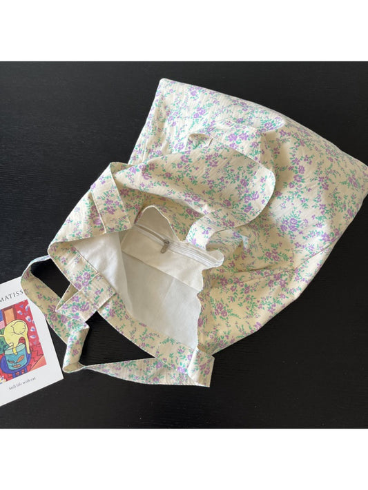 Close-up of Cosbai tote bag showing detailed ditsy flower pattern and fabric texture