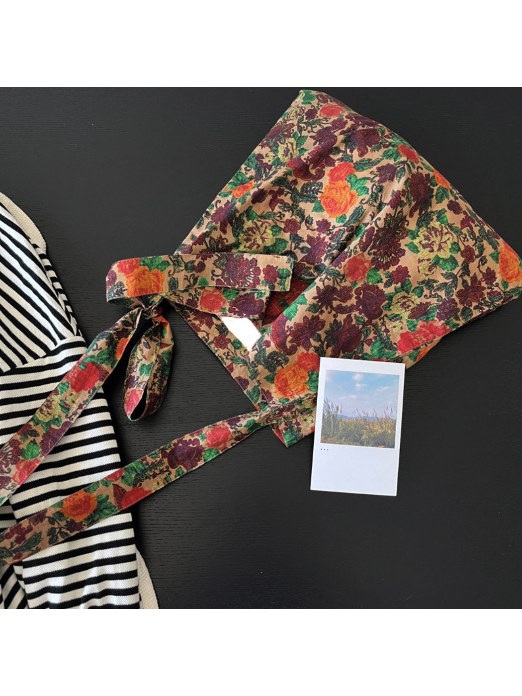 Cosbai Painterly Rose Slouch Tote displayed with interior partially visible
