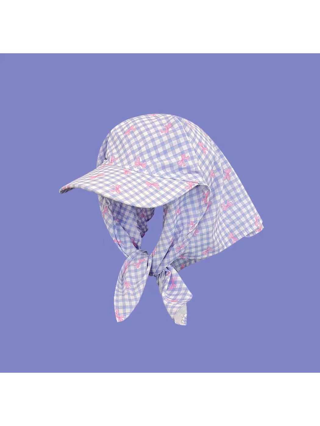 Close-up of Haila plaid turban hat highlighting the fabric pattern and texture