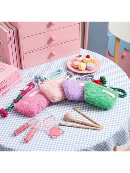 Cosbai fluffy mini pouch with wrist cord in soft fabric on white background