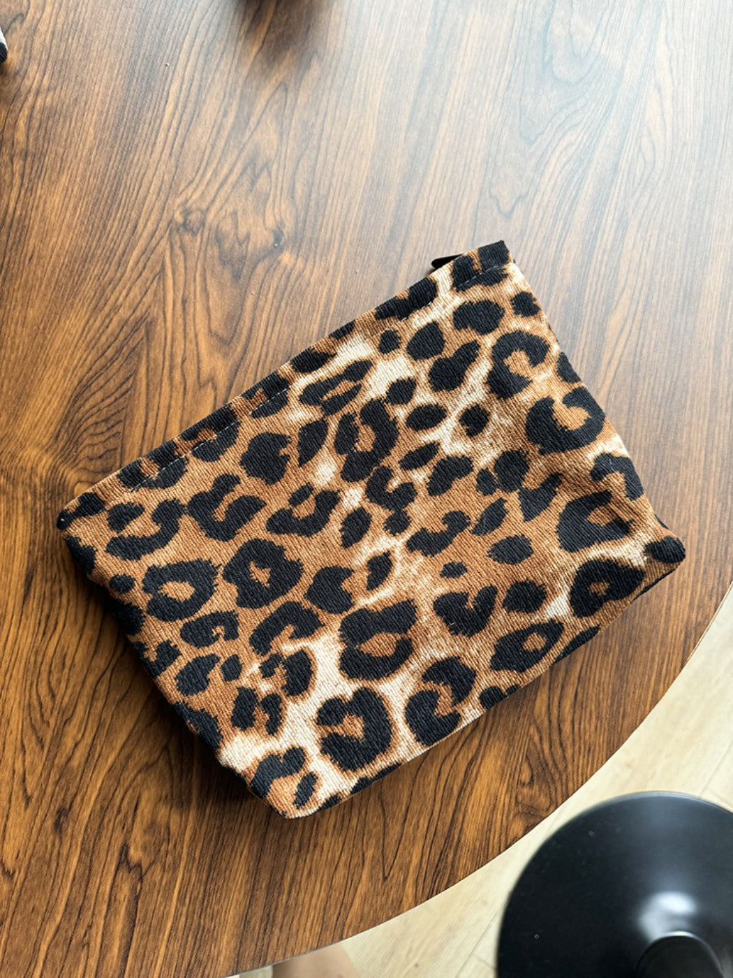 Top view of Cosbai leopard print pouch showing detail