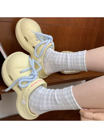 Rufia heart butterfly plaid crew socks displayed side by side