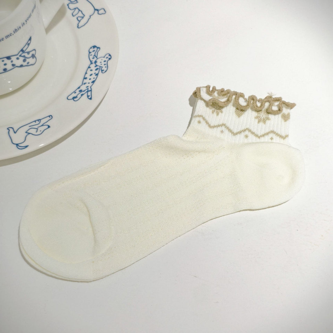 Rufia Nordic Heart Frill Crew Socks folded to show soft knit fabric and heart design