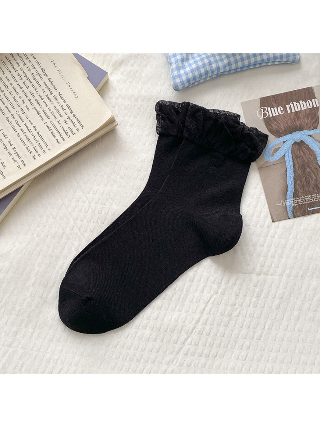 Side view of Rufia socks showing the frill trim around the cuff