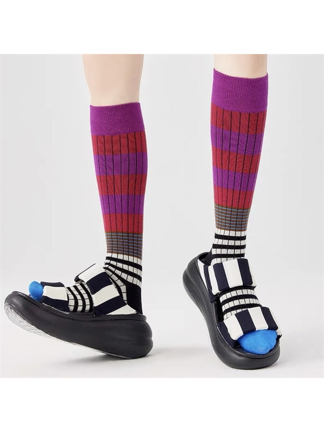 Rufia layered contrast stripe crew socks styled with denim jeans