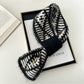 Scarvii - Two-Tone Knitted Scarf with Slip-Through Design