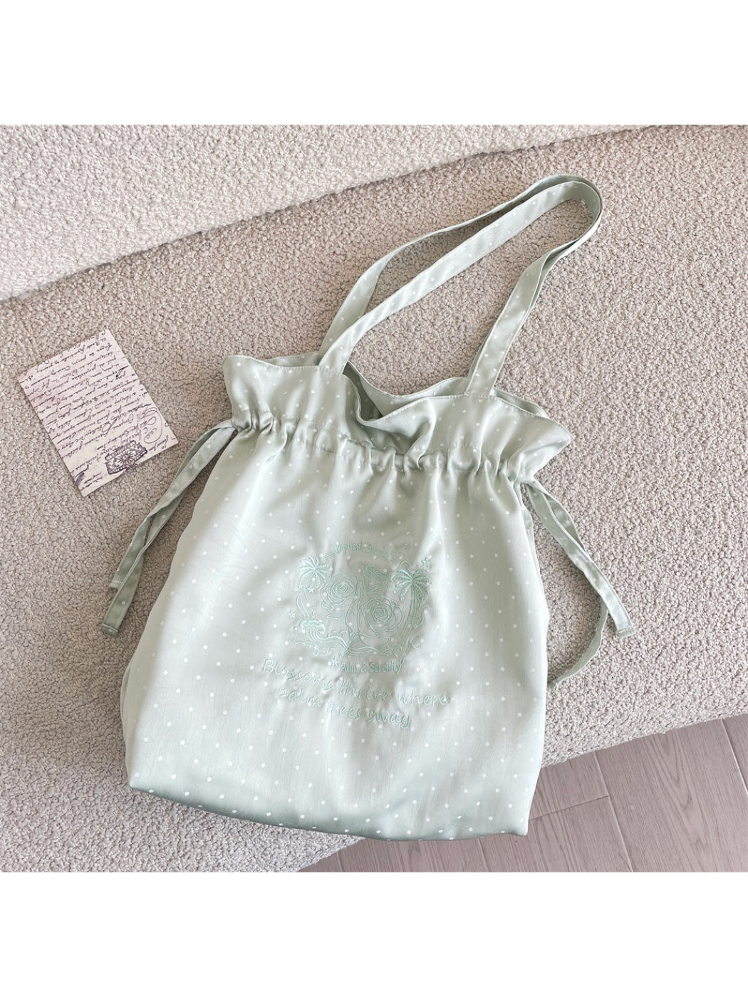 Cosbai polka dot shoulder bag open with visible interior lining