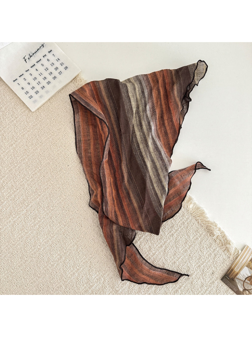 Folded sheer gradient neck triangle scarf displaying smooth color fade and lightweight material