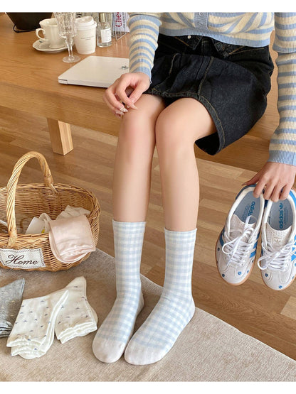 Rufia mixed print crew socks folded neatly with visible pattern details