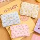Cosbai cute floral coin purse with colorful flower pattern on a white background