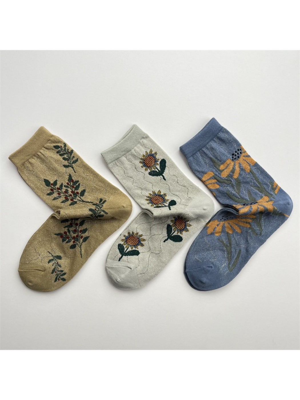 Rufia floral blue crew socks with botanical pattern