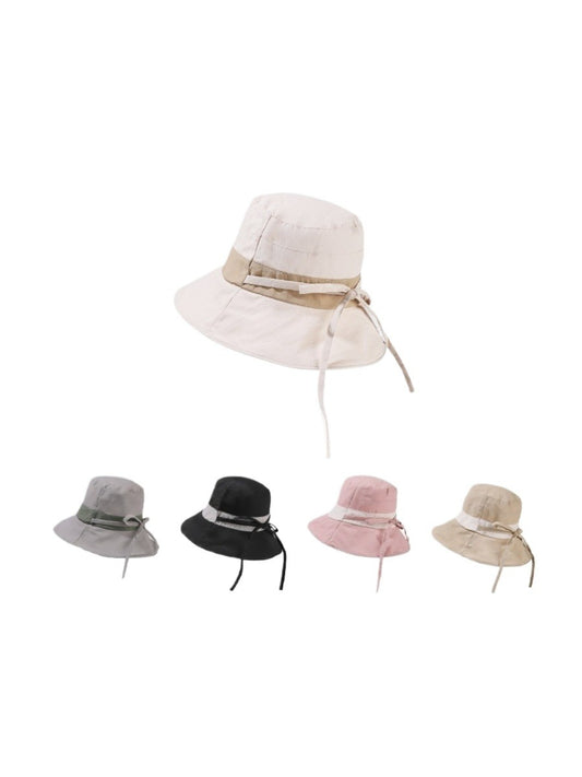 Haila bucket hat in beige with a wide ribbon band around the crown