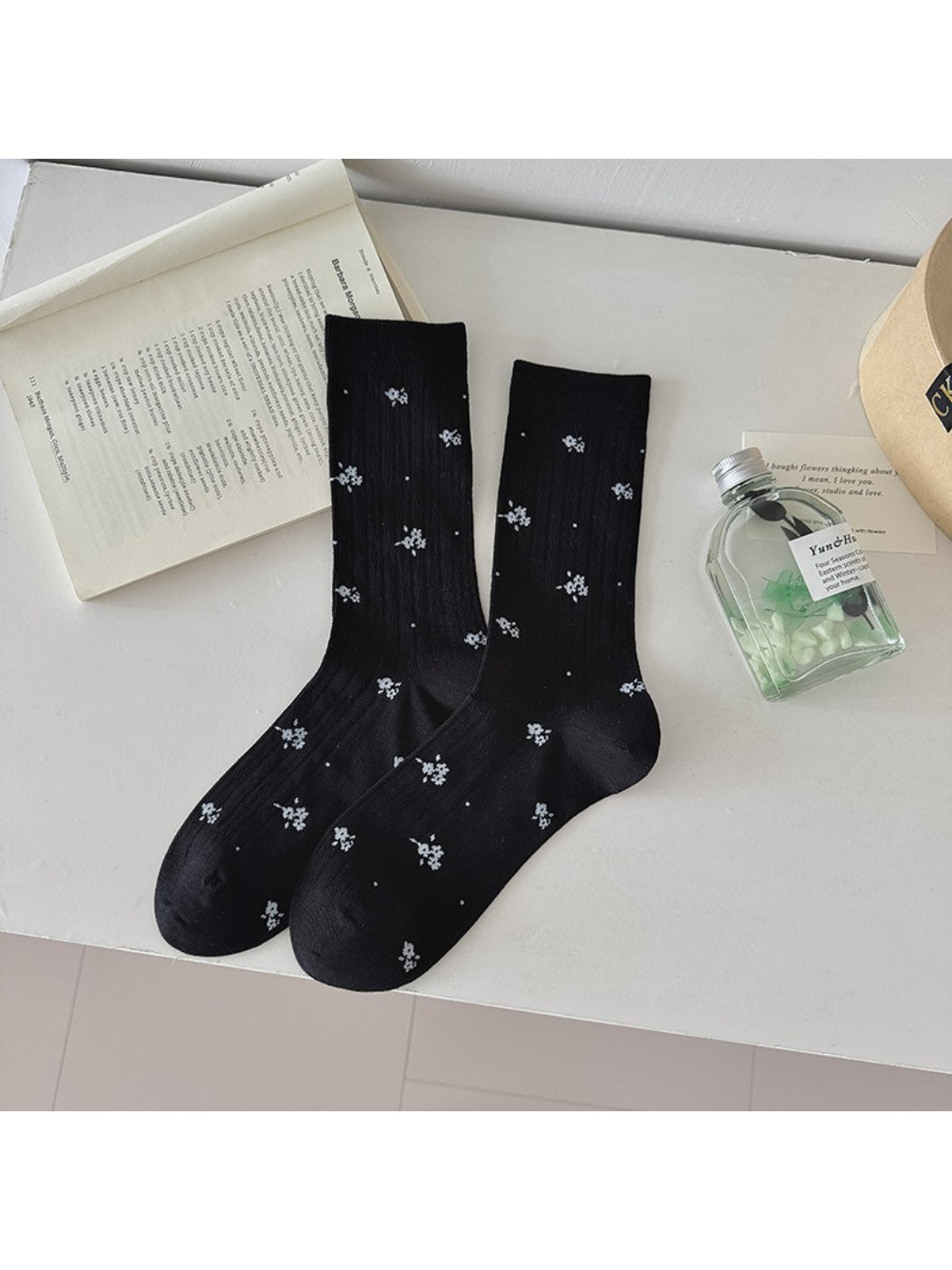 Rufia Ditsy Floral Ribbed Crew Socks styled with rolled-up jeans