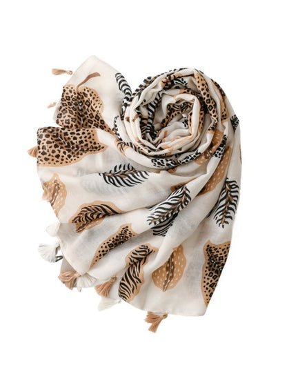 Scarvii Jungle Leaf Fringe Scarf folded neatly highlighting the vibrant green jungle leaf design
