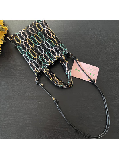Back view of Cosbai crossbody bag displaying plain fabric and strap detail