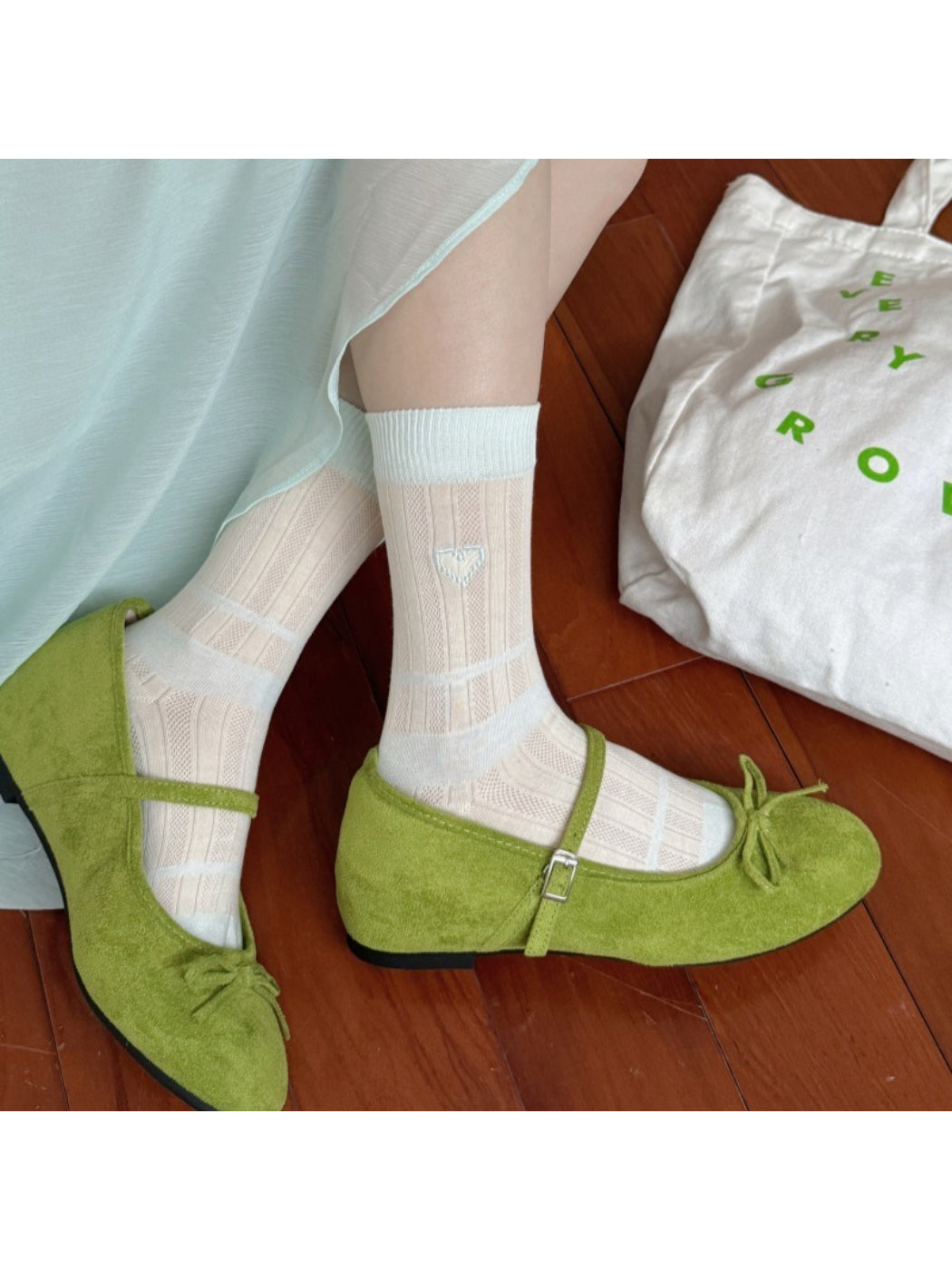 Close-up of Rufia heart socks showing soft fabric and colourblock pattern
