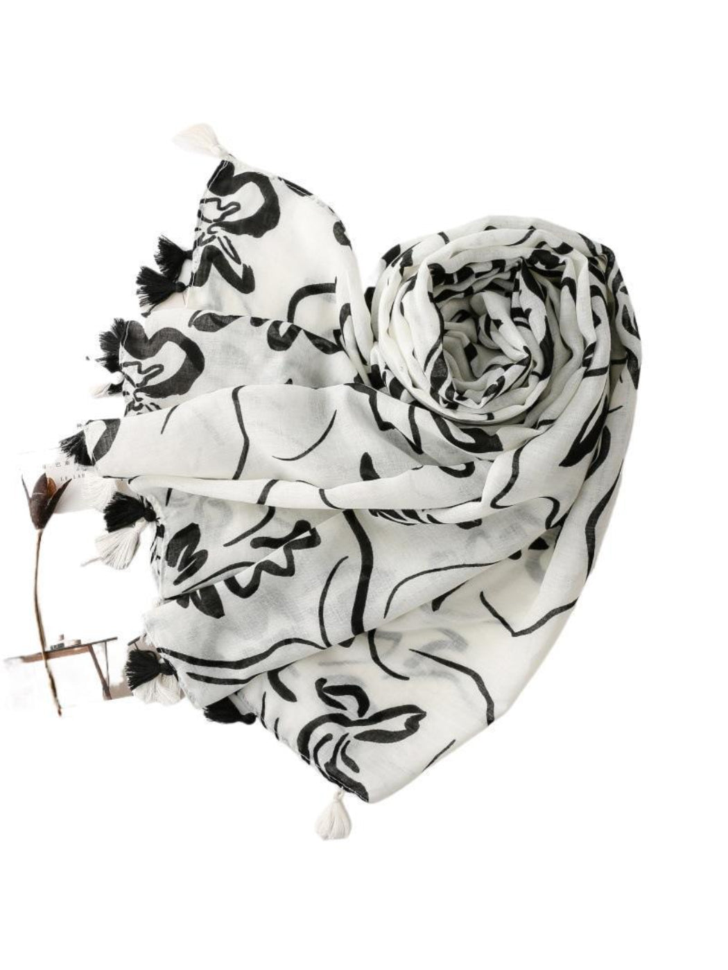 Scarvii scarf laid flat showing full floral sketch pattern and tassel trim