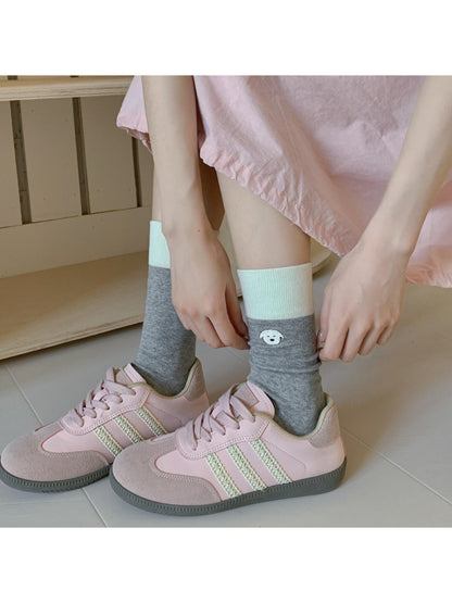 Pair of Rufia soft crew socks in light gray with embroidered cute animal face detail