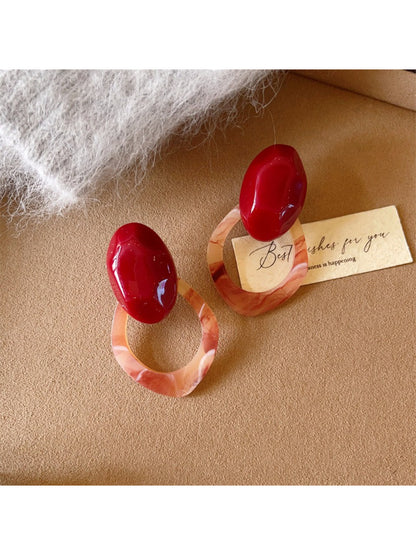 Side view of Earwish Color Block Oval Link Earrings highlighting the oval link design and gold accents