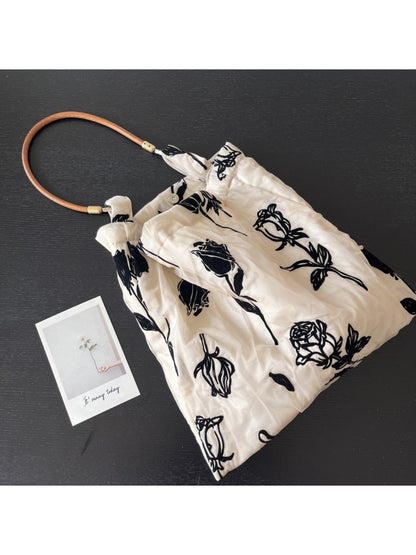 Close-up of floral print and texture on Cosbai Abstract Floral Slouch Shoulder Bag