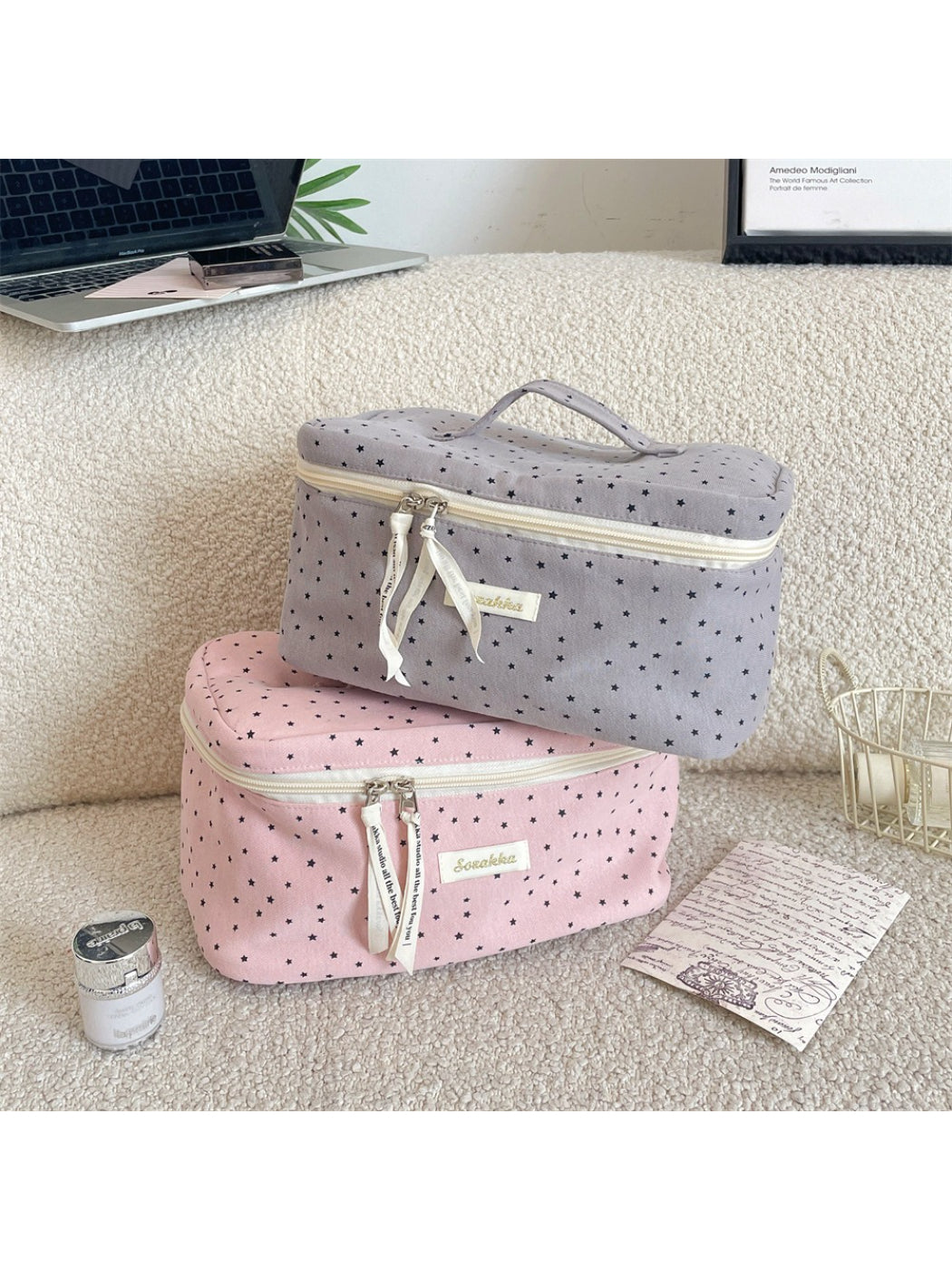 Cosbai star pattern makeup storage case open showing multiple compartments
