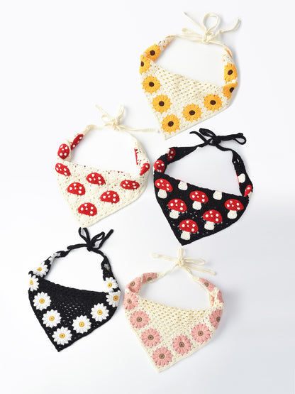 Close-up of crochet hairband featuring a sunflower and mushroom design