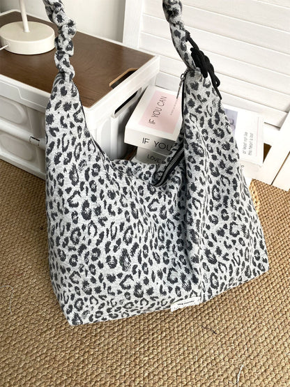 Cosbai leopard print shoulder bag displayed on model wearing casual outfit