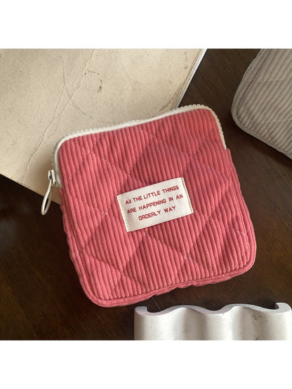 Cosbai cartoon print mini storage pouch photographed against plain background