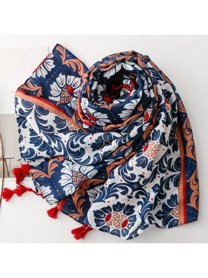 Scarvii tassel scarf draped over a chair displaying full design and tassel ends