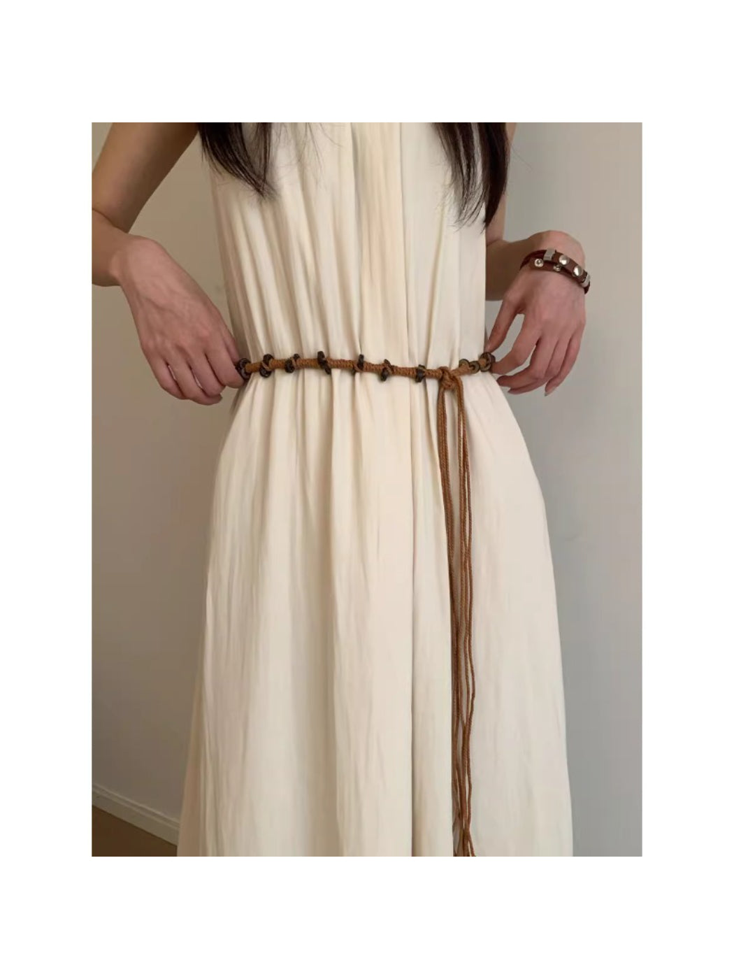 Beco knotted rope tie waist belt in natural beige color displayed flat