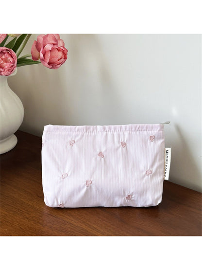 Cosbai Soft Stripe Heart Makeup Organizer Bag folded flat for easy storage