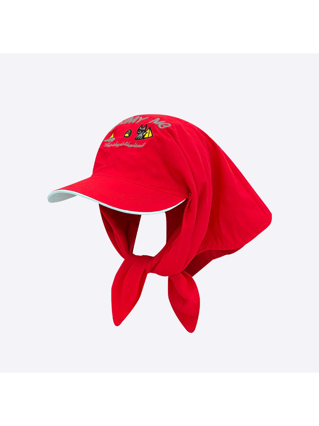 Haila turban hat with cartoon embroidery styled on a flat surface