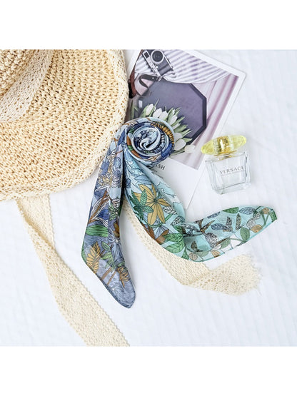 Close-up of Scarvii Botanical Scene Square Scarf fabric with detailed leaf and flower patterns