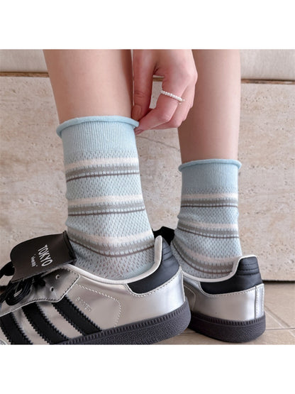 Rufia rolled edge stripe socks folded to show soft fabric texture and stripes