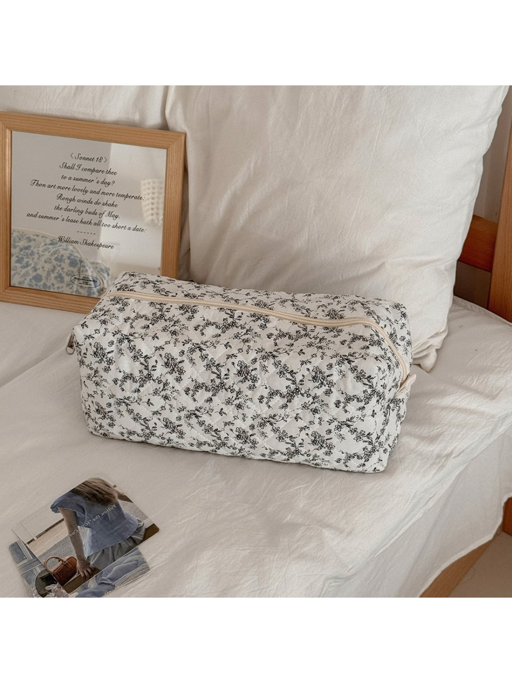 Side view of Cosbai vintage flower cosmetic pouch highlighting fabric texture