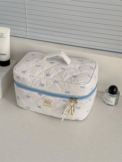 Cosbai Sweet Bow Beauty Organizer with a bow design on the front