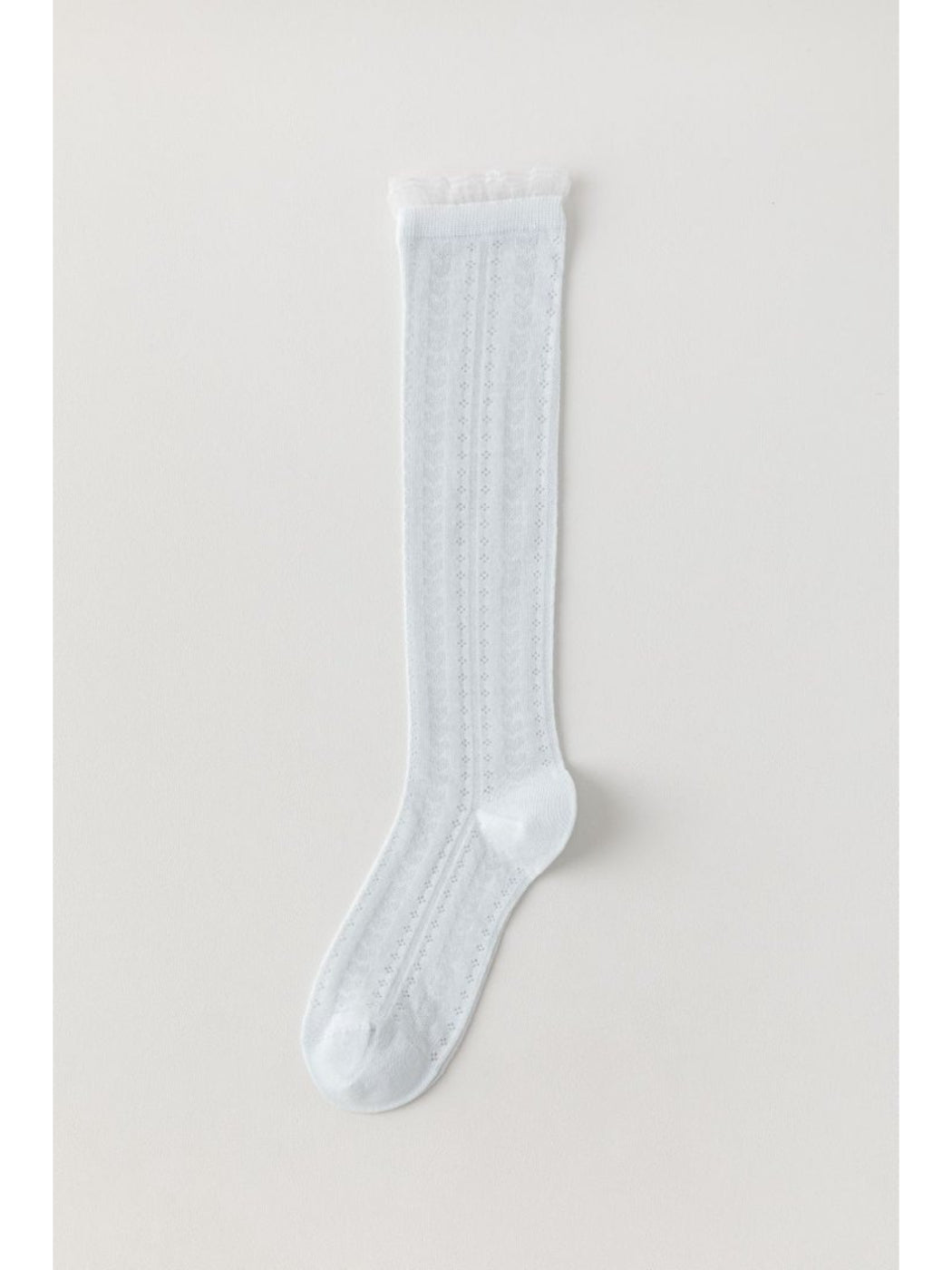 Rufia soft cable knee high socks folded showing texture and thickness