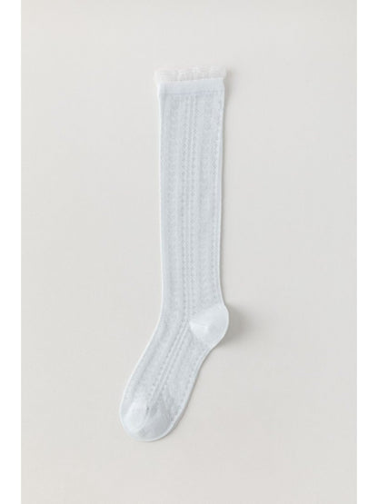 Rufia soft cable knee high socks folded showing texture and thickness