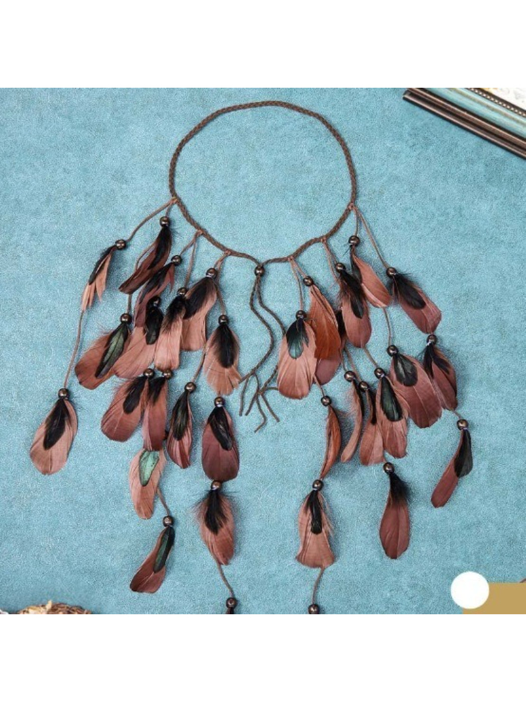 Boho full drop feather hair headpiece with layered feathers in natural tones