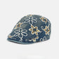 Haila floral sequin vintage newsboy cap displayed on a white background