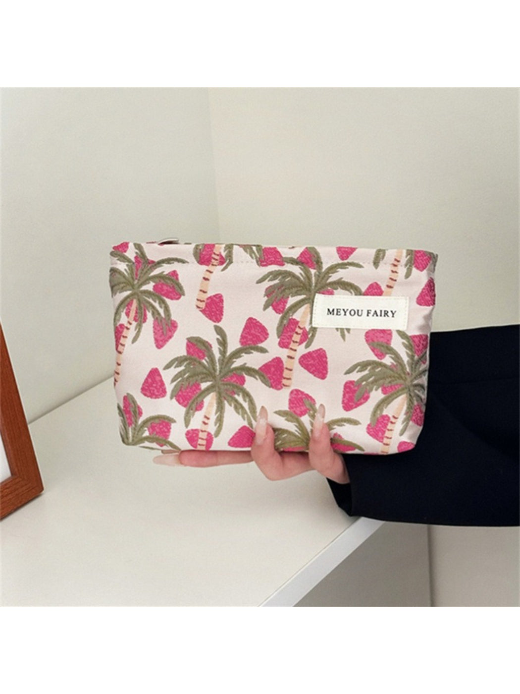 Cosbai Cute Tropical Travel Pouch displayed on wooden surface with travel accessories