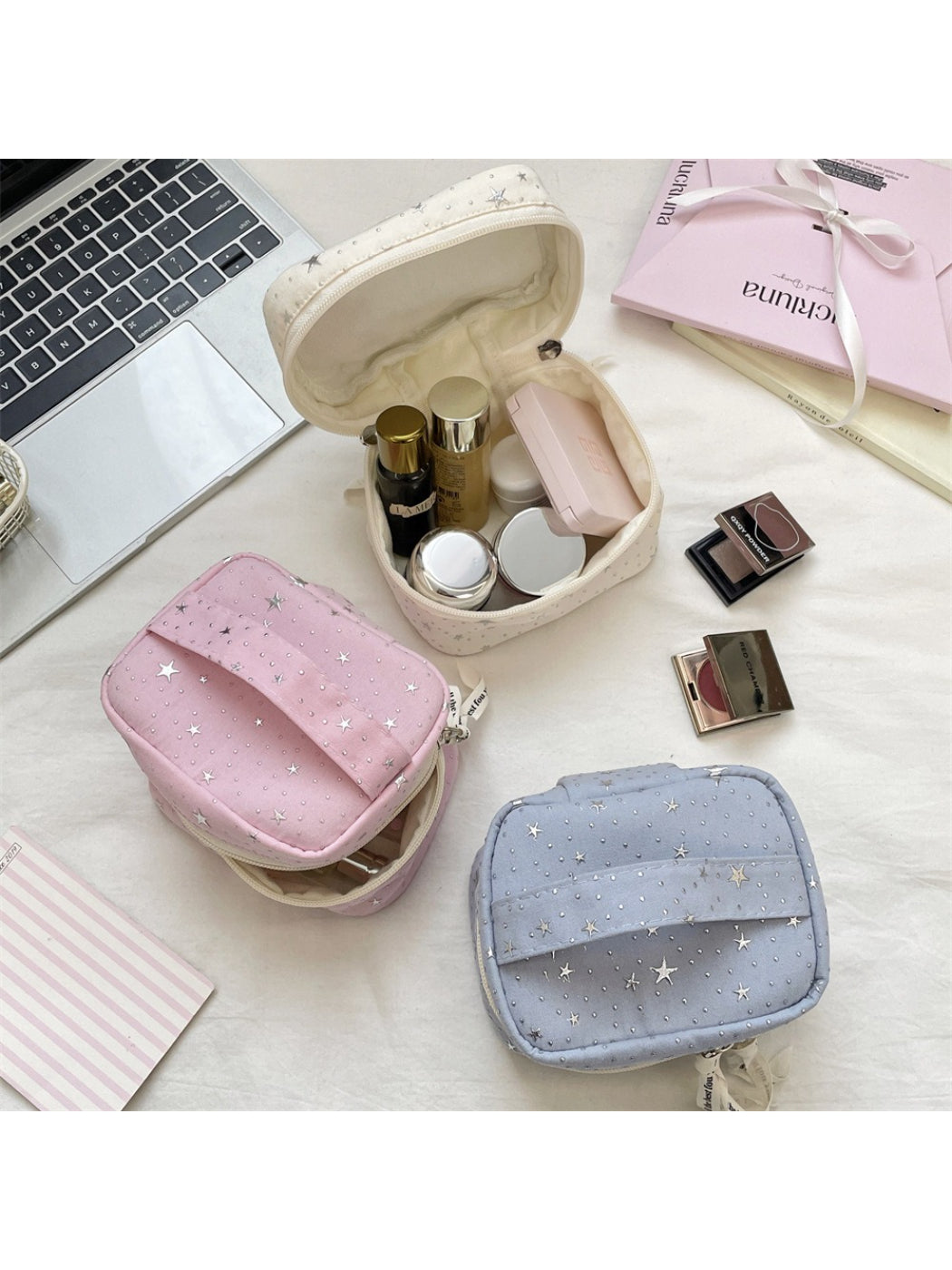 Close-up of Cosbai star print cosmetic makeup bag showing fabric texture