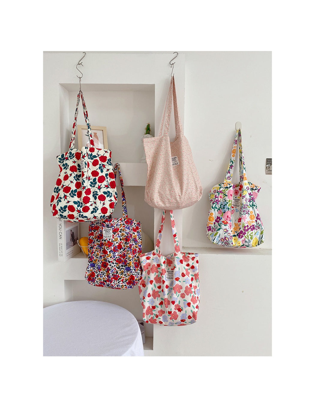 Cosbai tote bag folded flat to display its lightweight and flexible material
