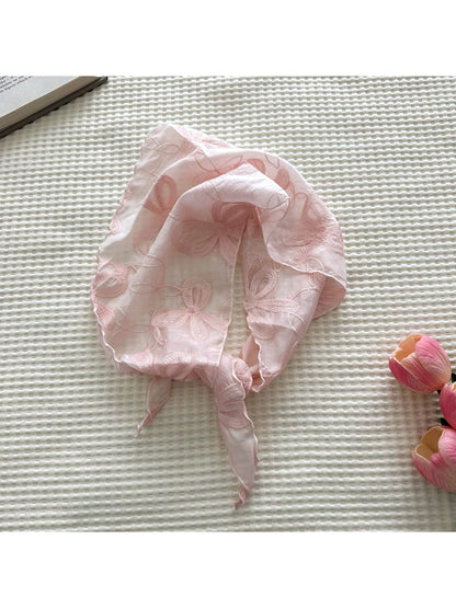Folded soft sheer triangle scarf highlighting intricate embroidery details