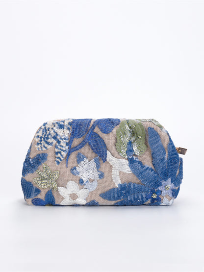 Cosbai clutch bag displayed on white surface emphasizing colorful floral sequins and compact size