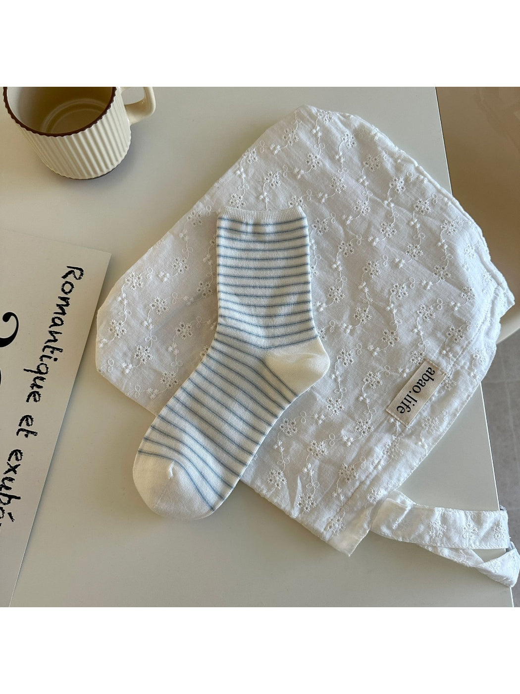 Side view of Rufia Classic Thin Stripe Crew Socks highlighting the thin stripes