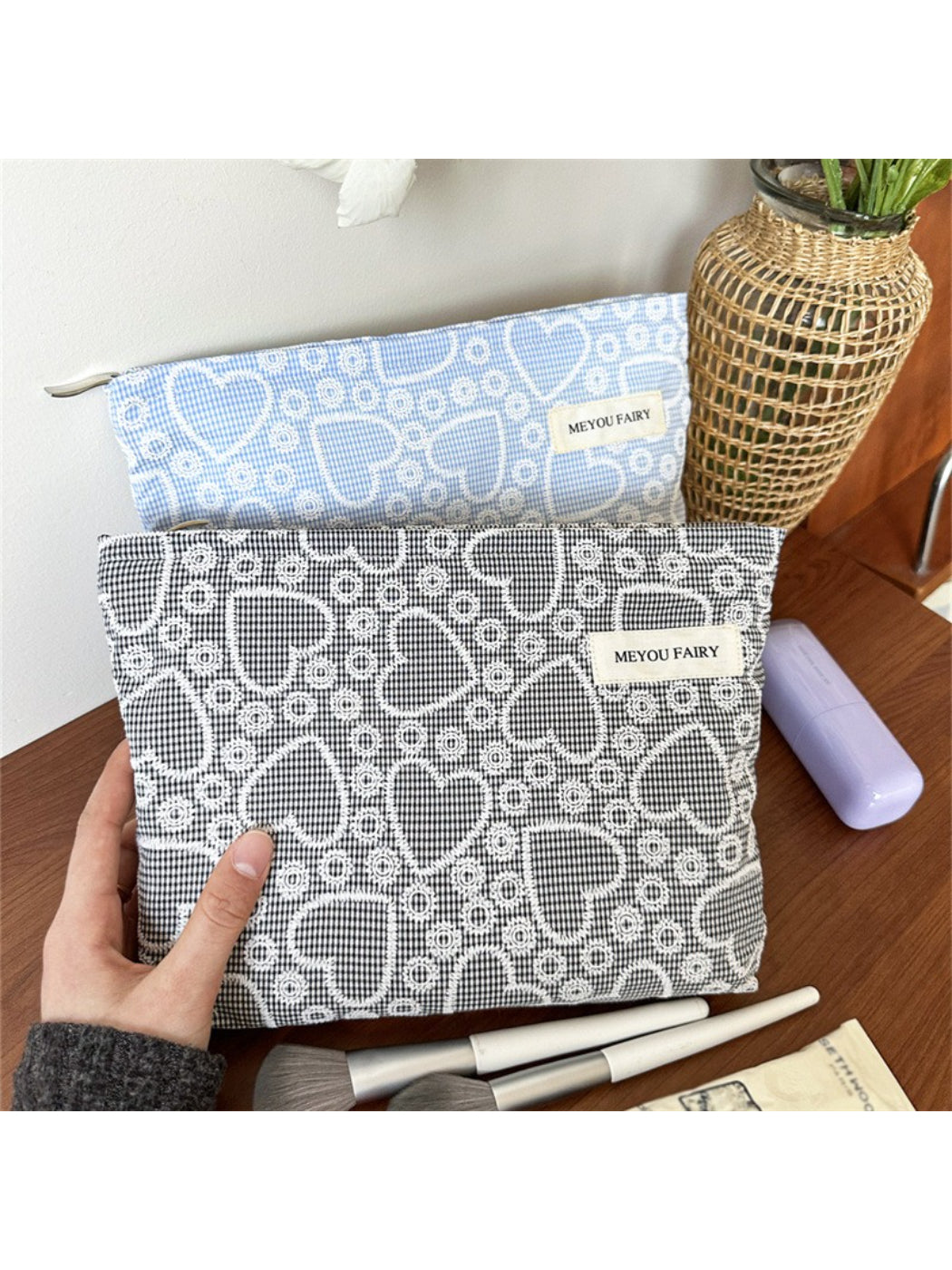 Cosbai makeup bag open, displaying spacious interior with pink lining