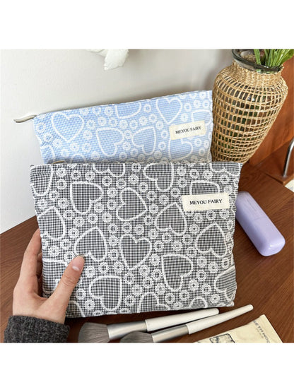 Cosbai makeup bag open, displaying spacious interior with pink lining