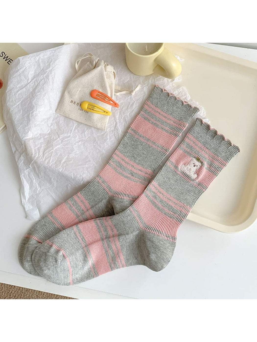 Close-up of sock heel and toe area on Rufia Soft Stripe Bear Crew Socks