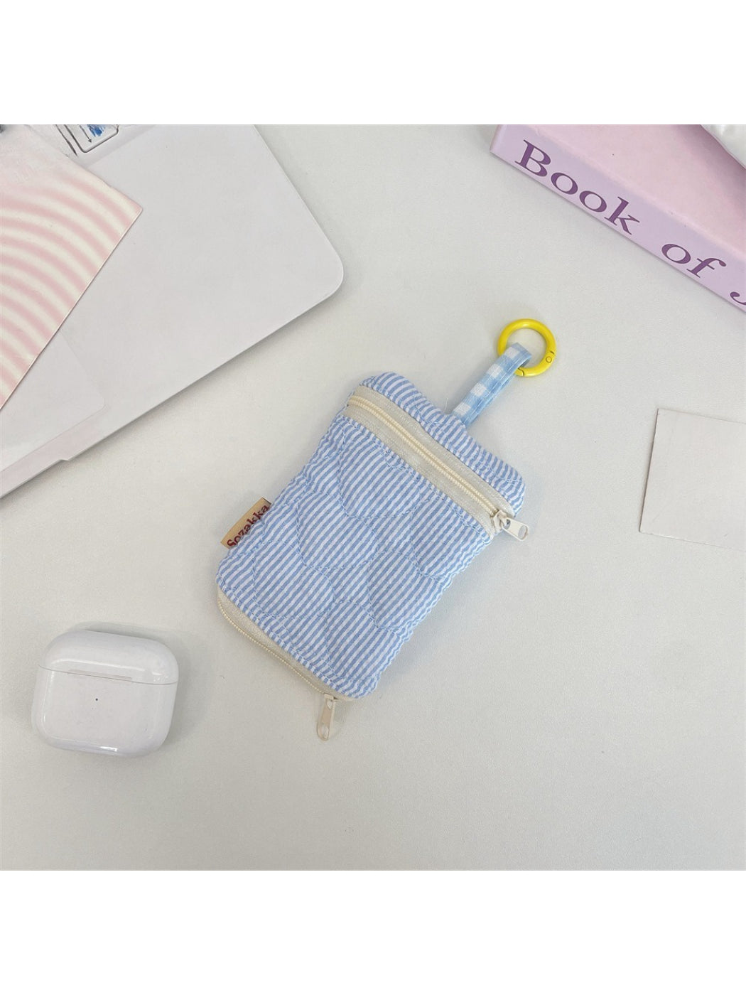 Top view of Cosbai Mini Zipper Key Pouch showing zipper pull and clip